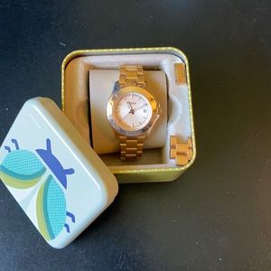 Fossil gold with rose gold face watch